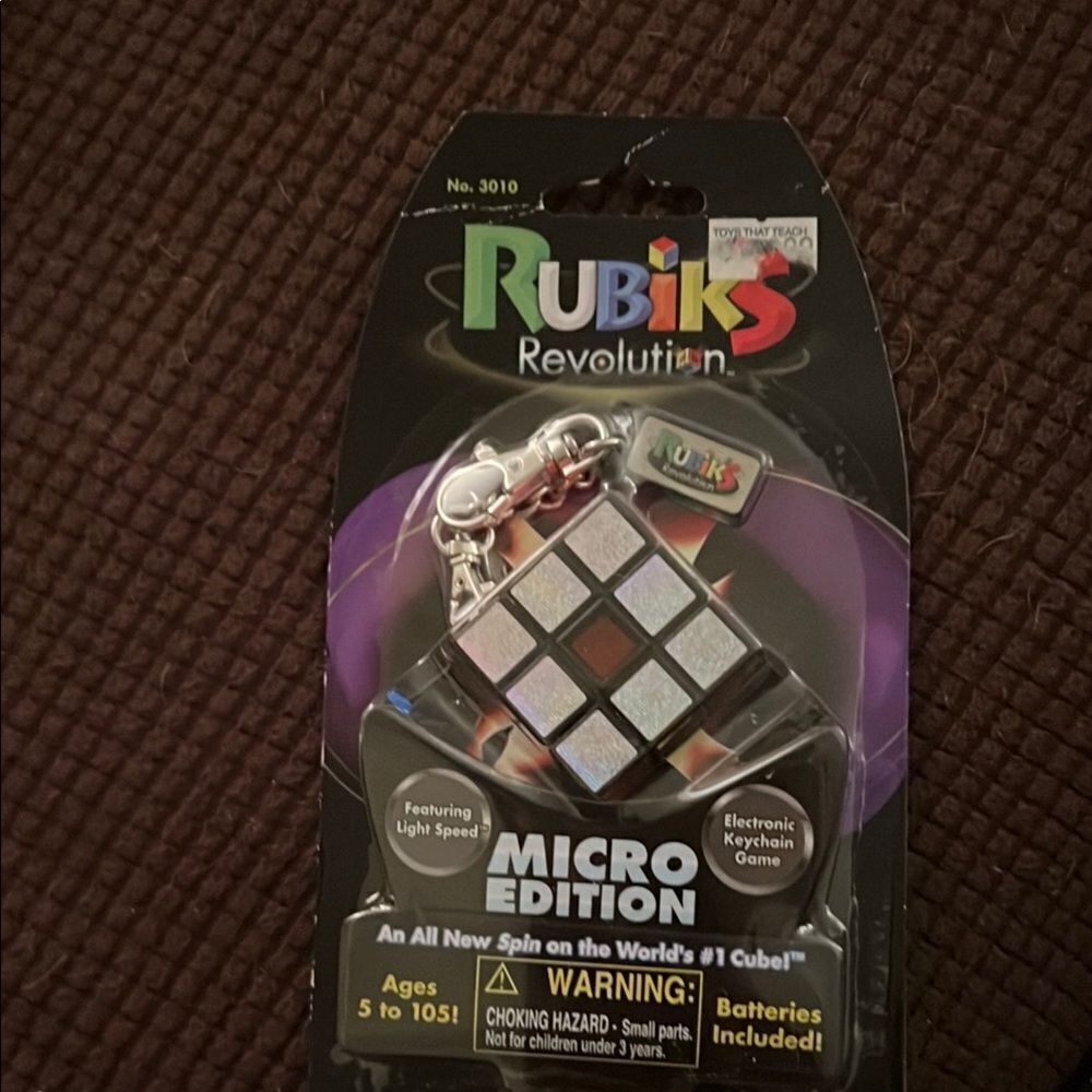 Brand new Rubiks Revolution electronic keychain game.